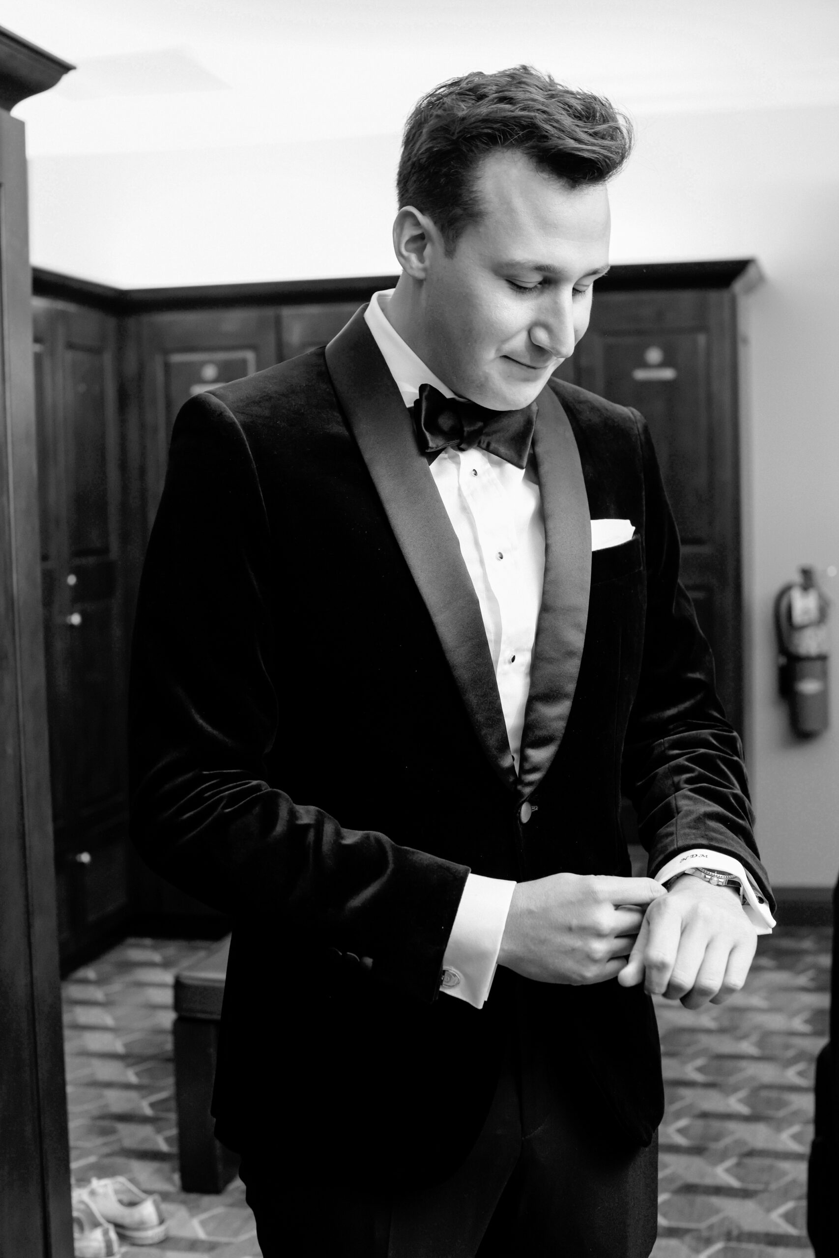 A black and white picture of a groom
