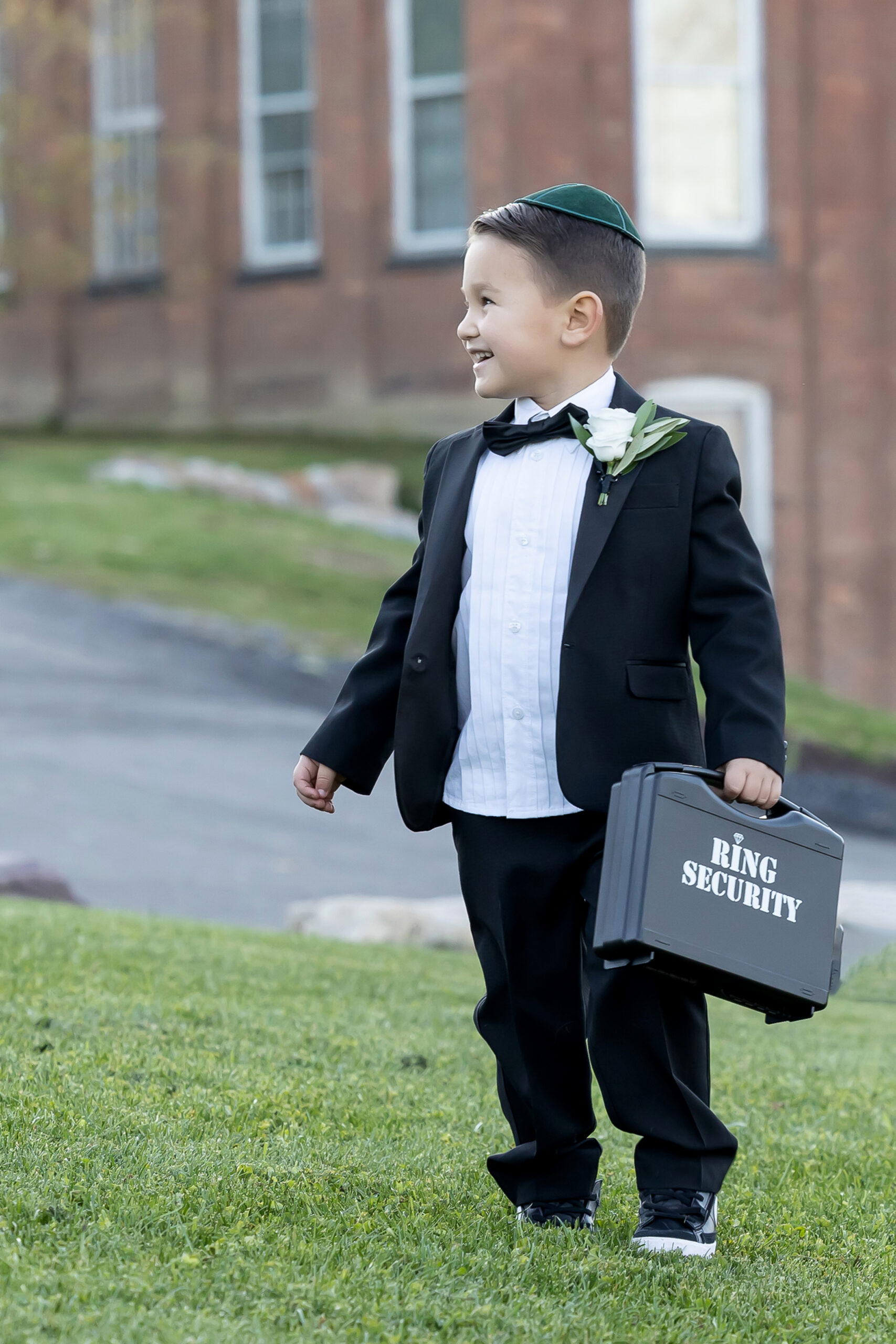 A small boy as the ring bearer